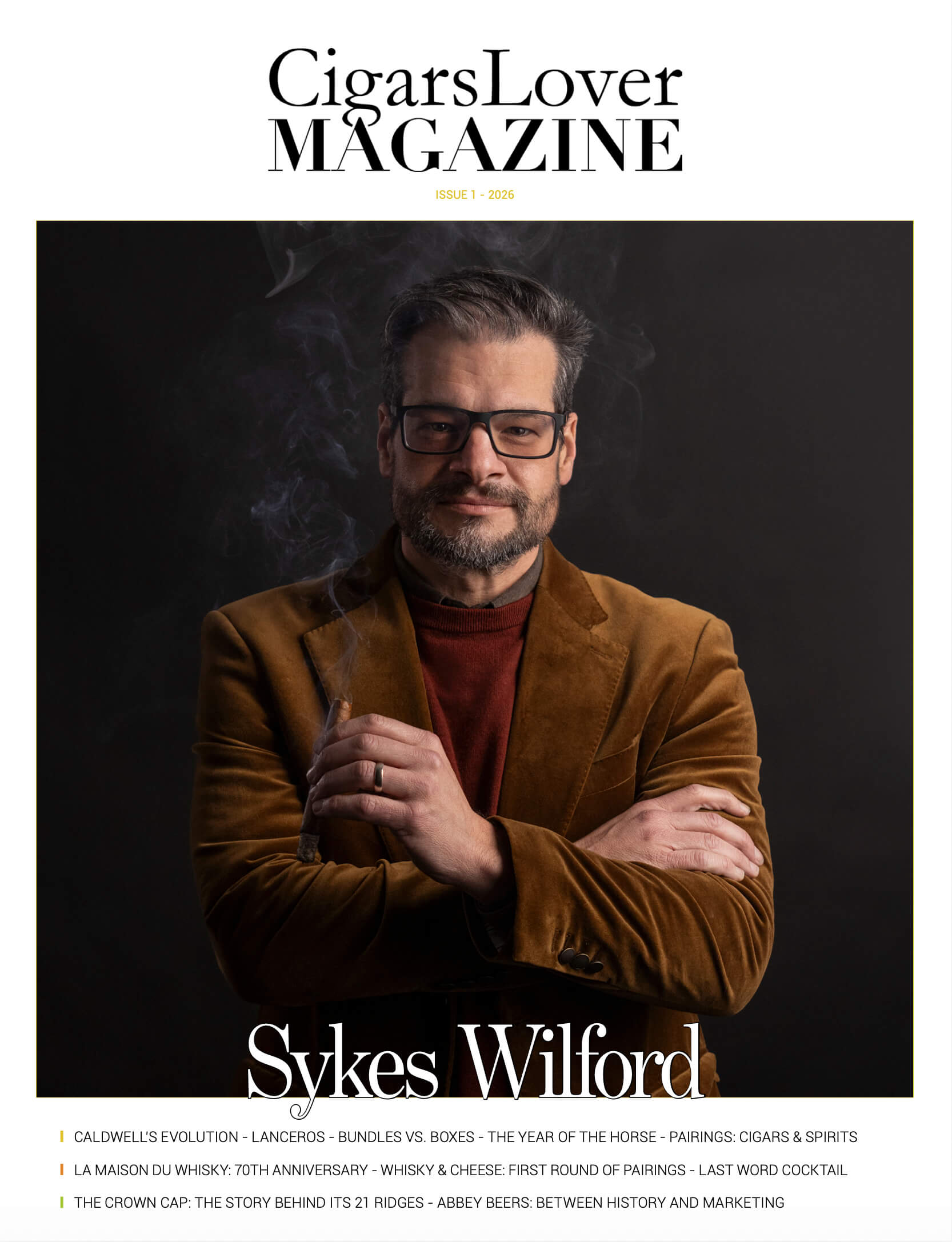 CigarsLover Magazine Issue 1 2026 cover featuring Sykes Wilford holding a cigar with smoke on a dark background